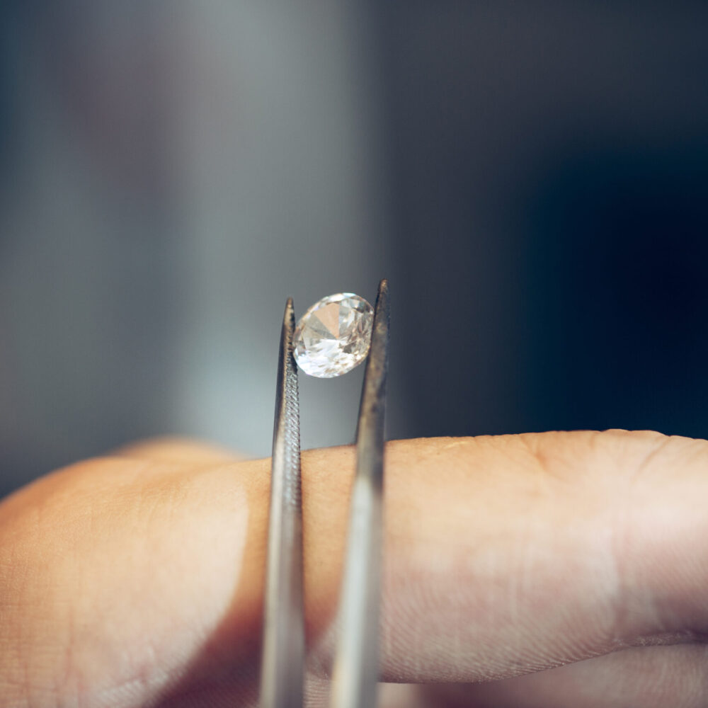 Different goldsmiths tools on the jewelry workplace. Jeweler at work in jewelry. Different goldsmiths tools on the jewelry workplace. Jeweler at work in jewelry. Desktop for craft jewelry making with professional tools. Close up view of tools.